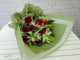 pure seed bq319 red roses & white lilies hand bouquet with light green wrappers