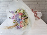 pureseed bq829 +  8 Roses, 3 Matthiolas, 1 Hydrangeas, 6 white Eustomas, 3 Lilac Eustomas, 5 Carnation Spray, Lace Flower and Baby Breath + hand bouquet