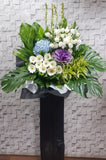 pureseed sy143 +  Gerberas, Hydrangeas, Eustomas, Tuberoses, Eustomas , brassica + sympathy stand