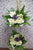 pureseed sy152 + gerberas, brassica, eustomas, tuberoses + sympathy stand