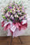 pureseed op217 +  Eustomas, Roses, Matthiolas, Wax Flower and Leaves + opening stand