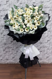 pureseed sy173 + Gerberas, chrysanthemum, ping pong + sympathy stand 