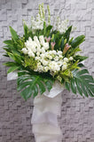 pureseed sy165 + roses, eustomas, lilies, matthiolas + sympathy stand