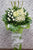 pureseed sy156 + gerbreas, ping pong, brassica, tuberoses + sympathy stand