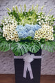 pureseed sy131 + hydrangeas, gerberas, eustomas, orchids, tuberoses + sympathy stand