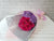 pure seed bq299 hot pink gerberas & purple statice flowers hand bouquet in light pink wrapper