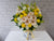 pure seed bk865 white roses + light orange gerberas + lilies + ping pongs floral centrepiece