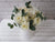 pure seed bk864 white roses, hydrangeas & eustomas table with eucalyptus leaves flower box