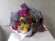 pure seed bq626 renuculus + roses + phalaenopsis orchids + eryngium + black berries + silver brunia + silver leaves flower bouquet