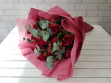 pure seed bq631 red roses + red berries + eucalyptus leaves hand bouquet in red wrappers