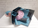 pure seed bq632 pink hydrangea hand bouquet in black & blue wrappers