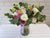 pure seed vs074 + Roses, Eustomas and Eucalyptus leaves + vase arrangement