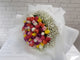 pure seed bq661 vibrant colored tulips & baby's breath flower bouquet with white wrappers