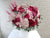 pure seed bk914 pink & red hued hydrangeas + roses + ping pongs + silver leaves table floral arrangement