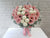 pure seed bk875 light pink gerberas + white ping pongs + silver leaves table flower arrangement