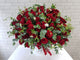 pure seed bk968 99 red roses + trachymene + eucalyptus leaves table arrangement