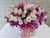 pure seed bk453 pink roses + white eustomas + purple orchids table flower arrangement