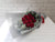 pure seed bq441 red roses & silver leaves hand bouquet in silver icy-toned wrappers