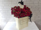 pure seed bk992 roses & jo malone cologne flower arrangment