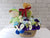 pure seed nb115 + Hydrangeas and Eustomas with a Musical Soft Toy and Brands of Chicken Essence + new born arrangement