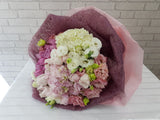 pure seed bq704 roses + hydrangeas + eustomas hand bouquet