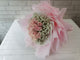 pure seed bq721 pink roses & baby's breath hand bouquet with pink wrapping papers