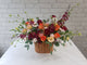 pure seed bk056 + Roses + Eustomas,+ Mokara Orchids + Lace Flowers + Silver Dollar Leaves + basket arrangement