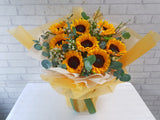pure seed bk069 + Sunflower and Silver Dollar Leaves + table arrangement