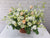 pureseed bk098 + roses, eustomas, orchids + flower basket arrangement