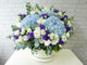 pure seed bk647 pastel blue hydrangeas + white & purple eustomas table flower arrangement