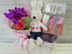 pure seed nb116 +  Mokara Orchids and Gerberas with a bunny toy and baby clothing + new born arrangement