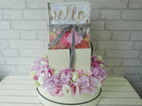 pure seed nb119 + Hydrangea and Eustomas and baby clothing + new born arrangement