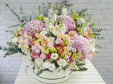 pure seed bk667 hydrangeas + matthiolas + roses + eustomas + eucalyptus leaves flower arrangement