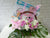 pure seed nb012 + roses, baby breath, soft toy, baby clothing + new born arrangement