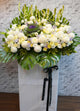 pureseed sy081 + roses, chrysanthemum, brassica, tuberoses, eustomas + sympathy stand