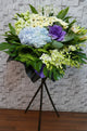 pureseed sy100 + Brassica Flower, Hydrangeas, Gerberas, Eustomas, Orchids, Lilies and Matthiolas + sympathy stand